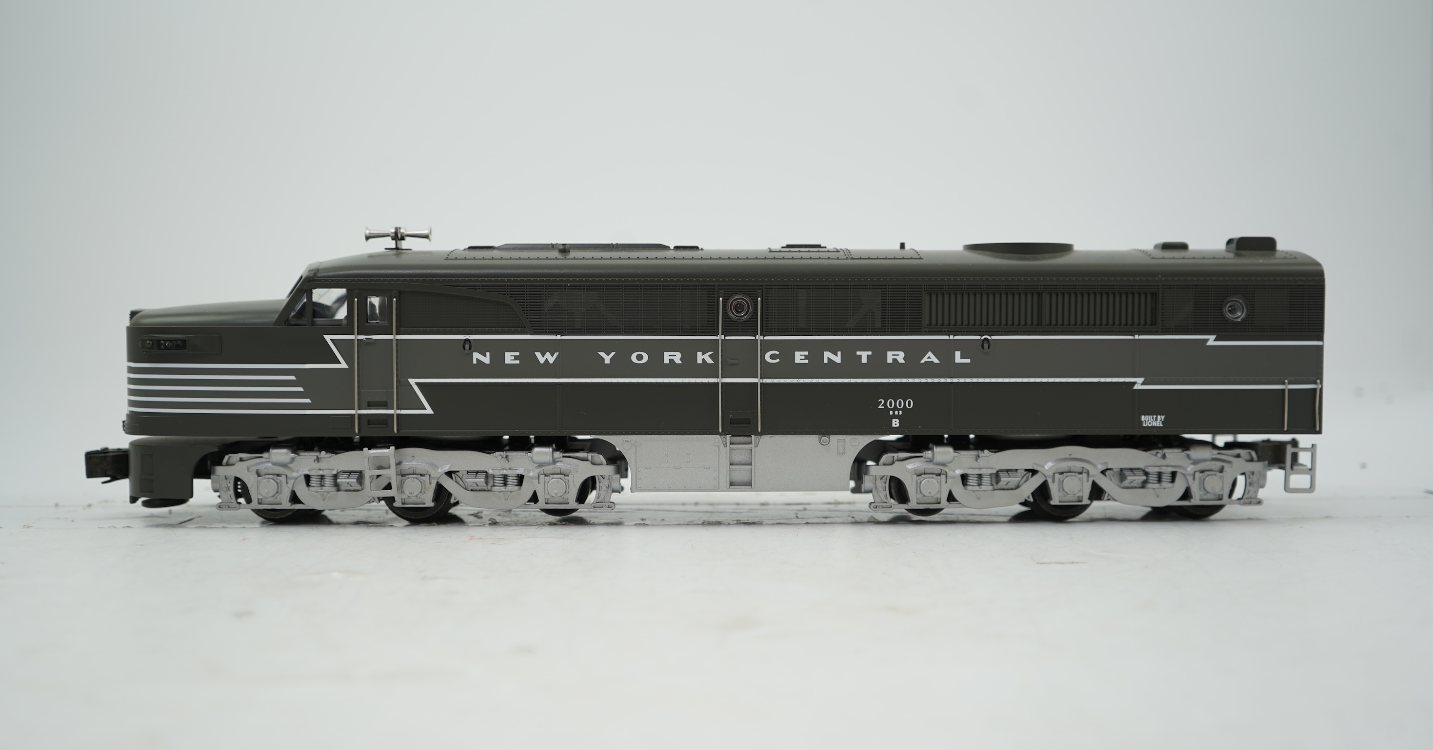 An 0 Gauge Lionel model of Alco PA-1 New York Central 2000, A1A-A1A diesel locomotive, powered for free rail operation, with owner’s manual.